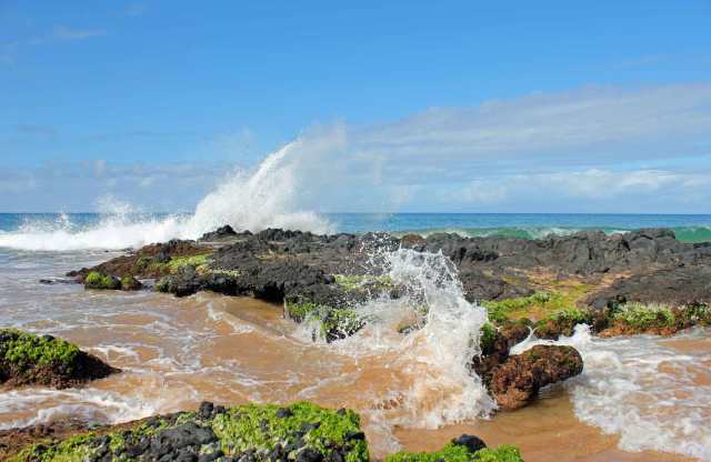 The expression "pounding surf" was apt here.  When the waves hit this rock formation in the right way, a huge, thunderous crash was heard.